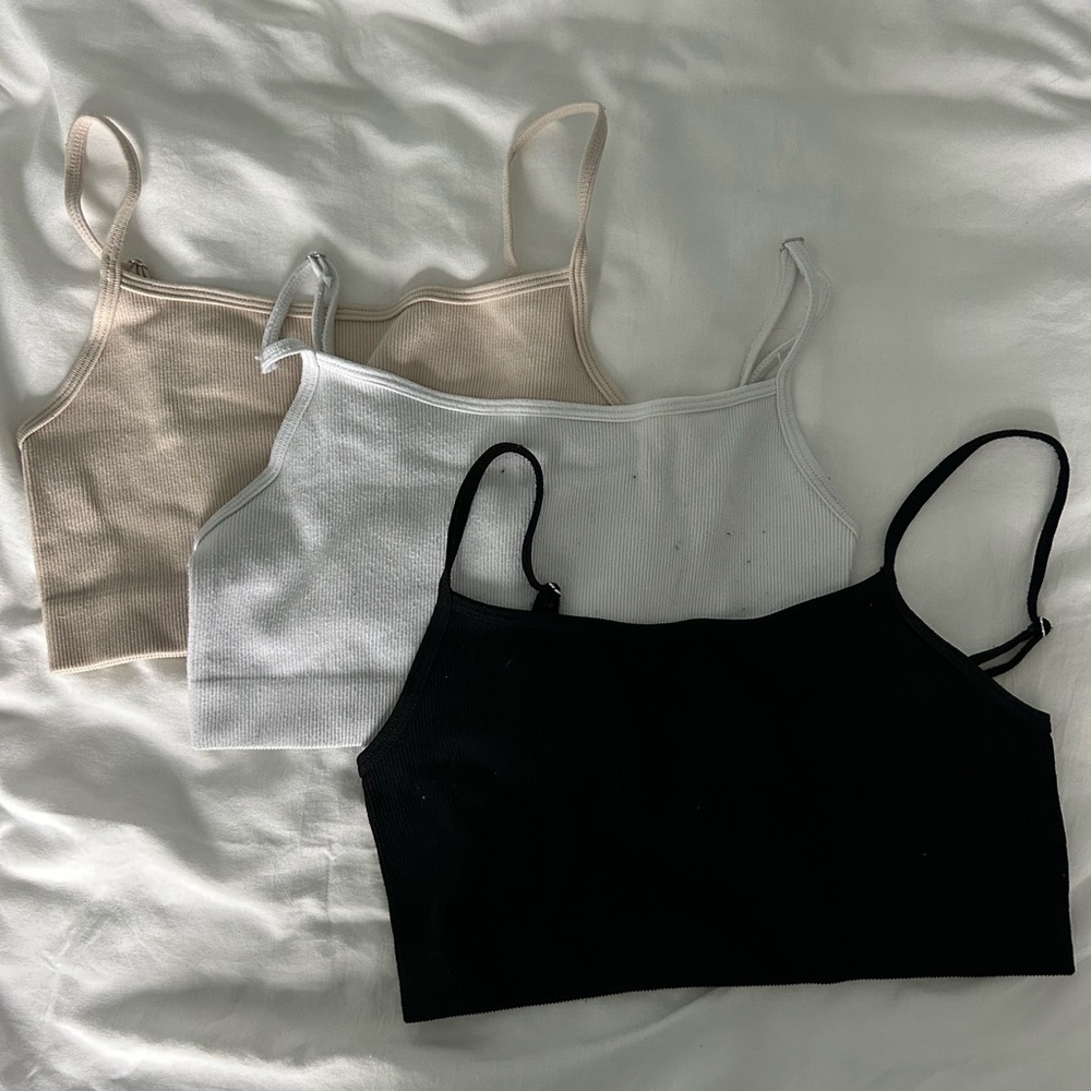 Set of three crop tops in white, cream and black all one size